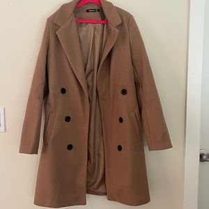Camel trench coat , gently used. Perfect for fall